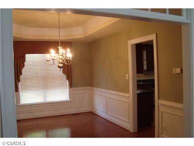 Dining Room - Beyond the living room is the dining