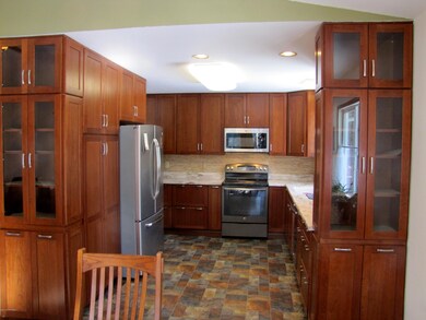 Beautiful cabinets w/cupboard pantry.