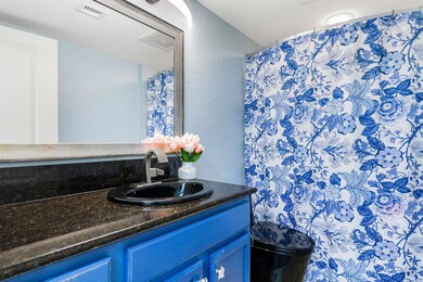 Bathroom featuring vanity