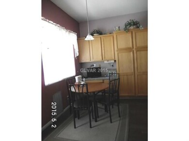 Property Photo. Eating Area and Extended Cabinets