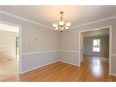 Dining Room with Views to the Kitchen and Family R