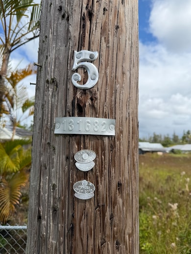 Lot sits between utility poles #4 and #5.