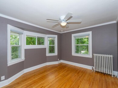 Upper level Master Bedroom has original hardwood f