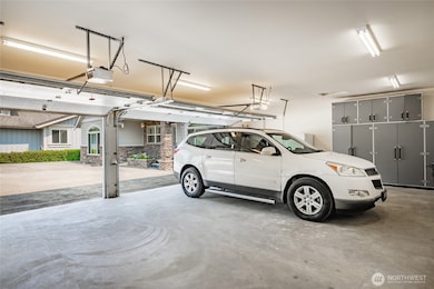 845 sq. ft 3 car garage with storage.