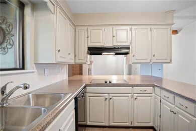 Kitchen opens into the adjoining room which could 