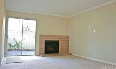 Fireplace and deck off the living room make for a 
