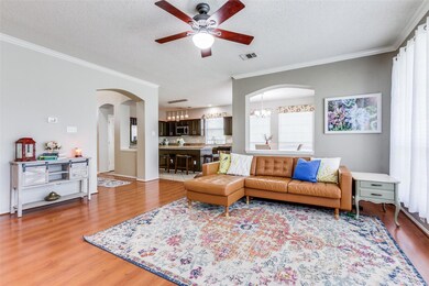 Another view of living room to kitchen and breakfast area.