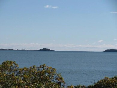 Several islands dot the landscape in...