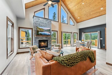 Living room featuring walls of windows!