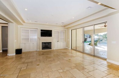 Family Room - glass wall opens to patio