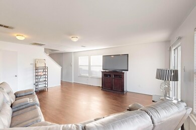 Living room featuring hardwood / wood-style floori