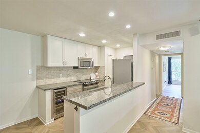 Don't you just love the white shaker style cabinet