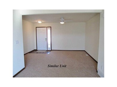 Living Room-L1. Picture is of Similar Unit.