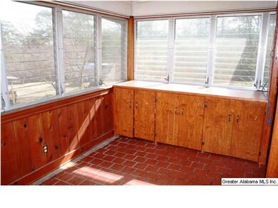 THE SUNROOM PROVIDES A PLEASANT SPACE TO RELAX. IT