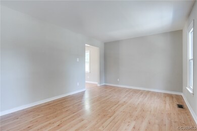 This view of the living room shows the entry into