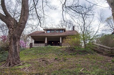 The Front of the home is private with beautiful tr