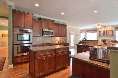 This spacious kitchen has beautiful cabinetry and 