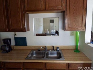 Wash dishes and talk to family through your little