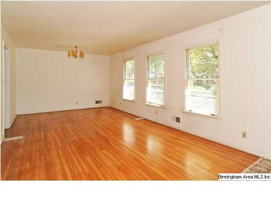 Living/dining room viewed from near front entry.