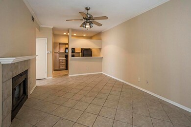 Living and dining area with extensive ceramic tile