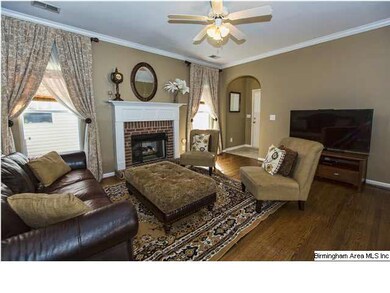 Large den with gas fireplace features lots of spac