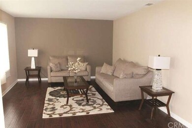 Living-room- new laminate wood floor, fresh paint 