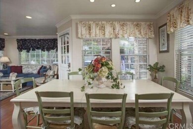 Main Home: Dining Room with View to Living Room