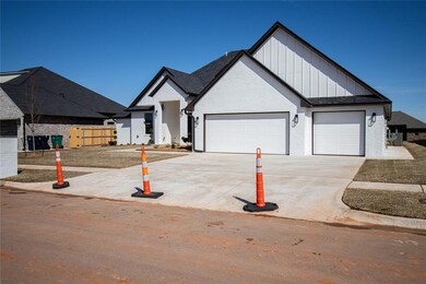 Modern inspired farmhouse featuring a garage