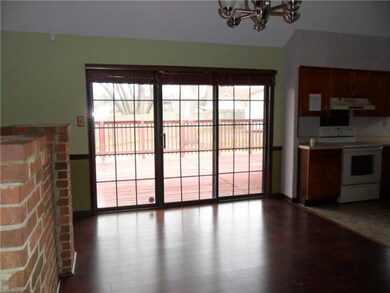 Nice dining room with french doors opening to larg