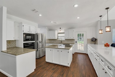 Another view of the kitchen. Plenty of counter and