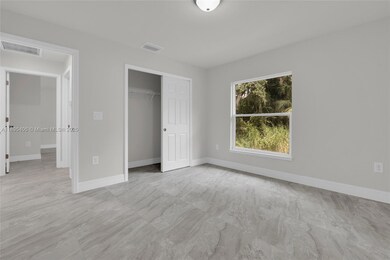 1006 Asther St E, Lehigh Acres, FL 33974 - photo 3