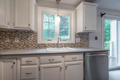 Window over sink lets in ample natural lighting