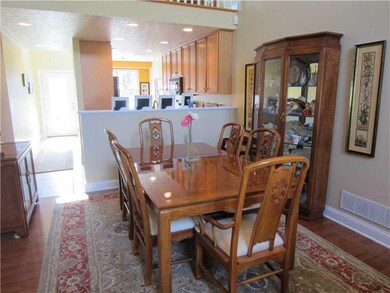 Dining Room. Neutral painted walls, hardwood floor