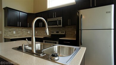 1217 Kingman Ct SW, Byron Center, MI 49315 - photo 4