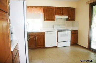easy access to deck, updated cabinets, tiled floor.