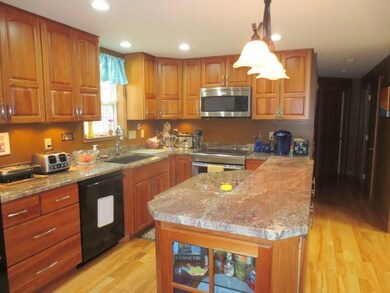Kitchen with Granite Counters,...