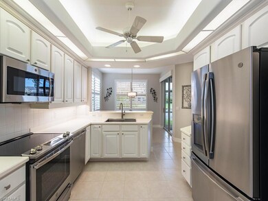 Kitchen with newer appliances open to breakfast no