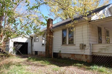 Side of House and Garage