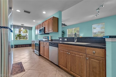Kitchen featuring sink, a wealth of natural light,