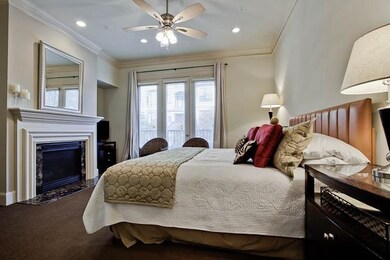 Master bedroom with fireplace, Juliette balcony, b