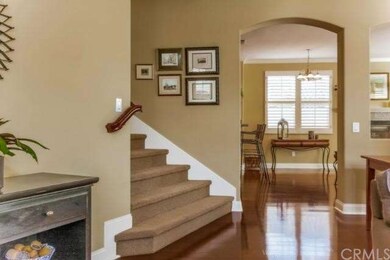 Notice the beautiful and rich wood floors, along w