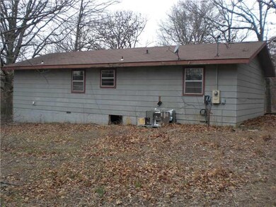 Exterior Back. Back of House, HAVC has been vandalized.