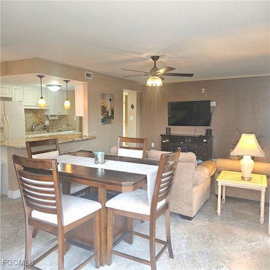 Dining room featuring a ceiling fan