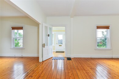 The entry and east facing windows look out over Ea