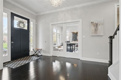 Dazzling hardwood floors just inside the entry, wi