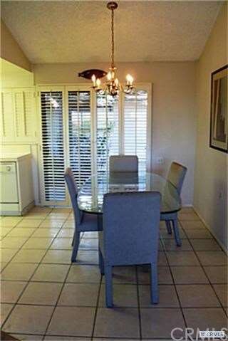 The dining room opens to the rear courtyard