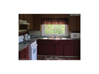 Open Kitchen, large window over sink & new floorin
