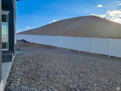 View of fenced backyard