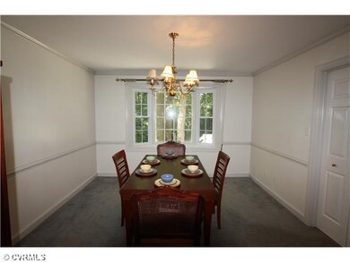 Dining Room - This Formal Dining Room offers carpe