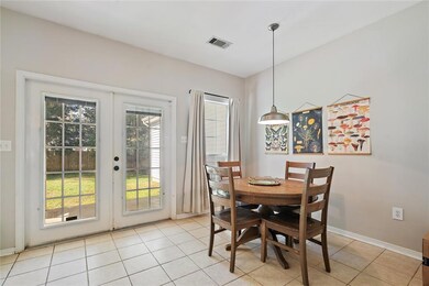 French doors leading to covered back porch